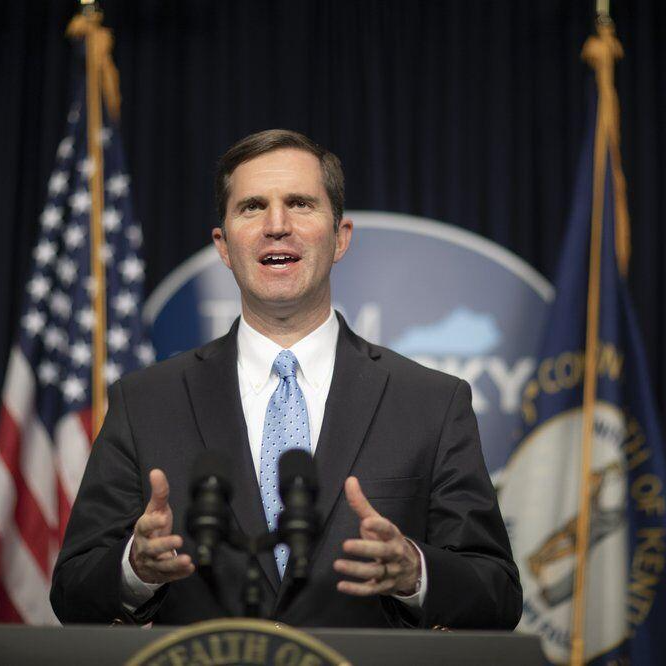 Beshear at podium